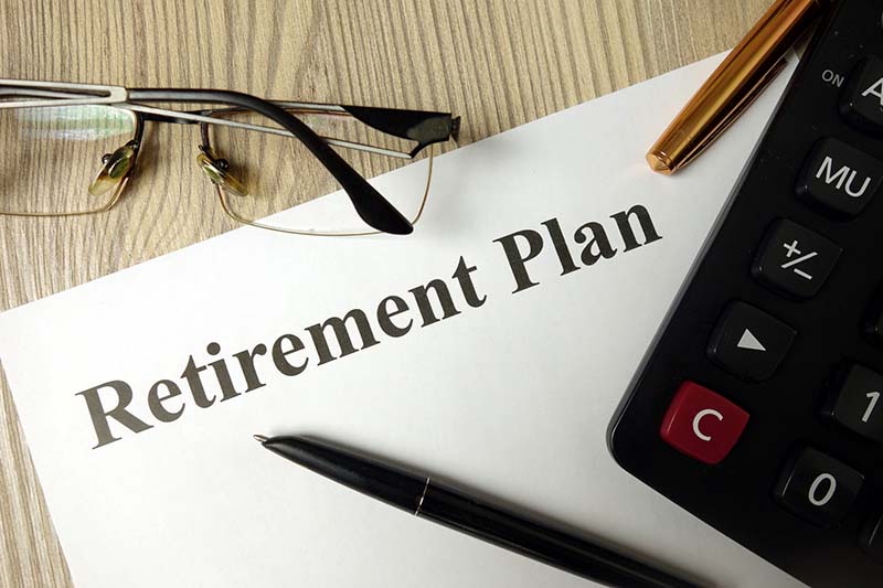 A paper on a desk that says Retirement.