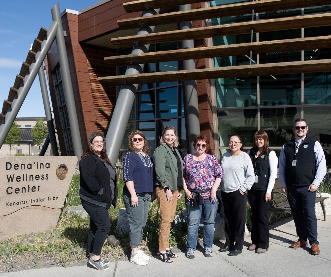 Kenai staff in front of wellness center