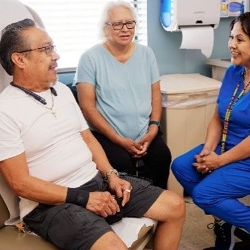 Elders in an exam room with a doctor