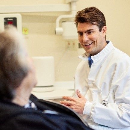 Dentist and patient in office