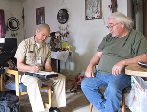 US Public Health Service Officer performing a site visit