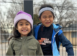 Two Native girl smiling