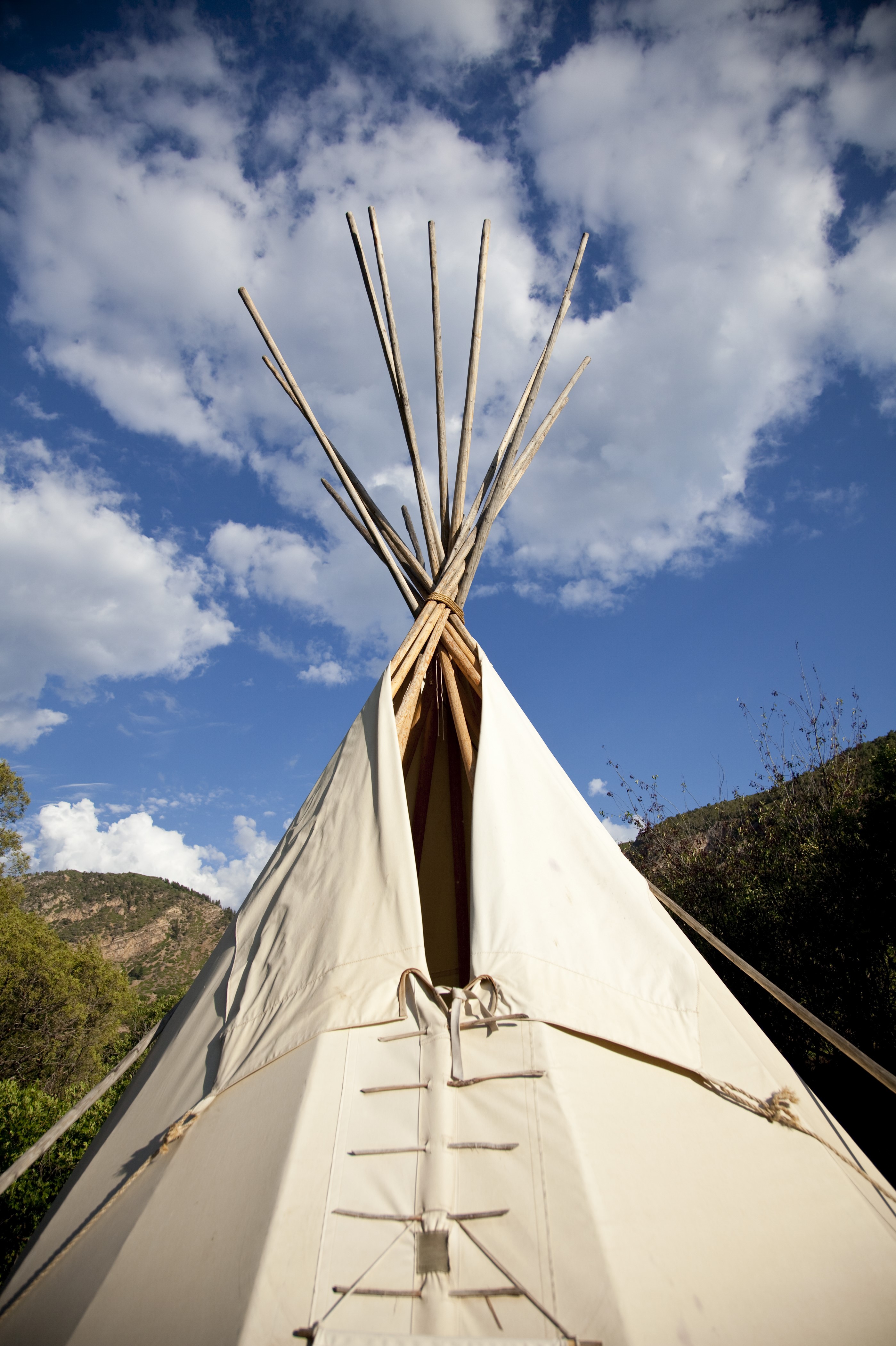 A Tipi with a blue sky in the background